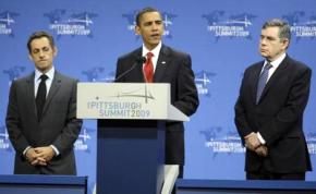 Barack Obama flanked by French President Nicolas Sarkozy (left) and British Prime Minister Gordon Brown