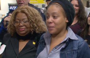 Jakadrien Turner arriving home in Texas, standing with her grandmother (left)