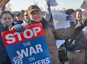 Members and supporters of Teamsters Local 804 rally in defense of 250 fired workers