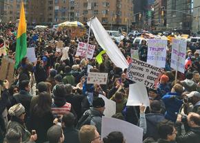 New Yorkers gather at the bottom of Central Park to protest Donald Trump