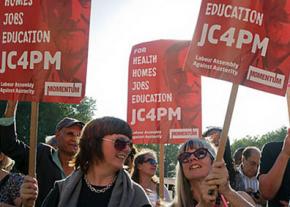 Supporters of Labor Party leader Jeremy Corbyn rally in London