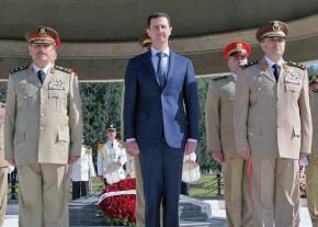 Syrian dictator Bashar al-Assad surrounded by his generals